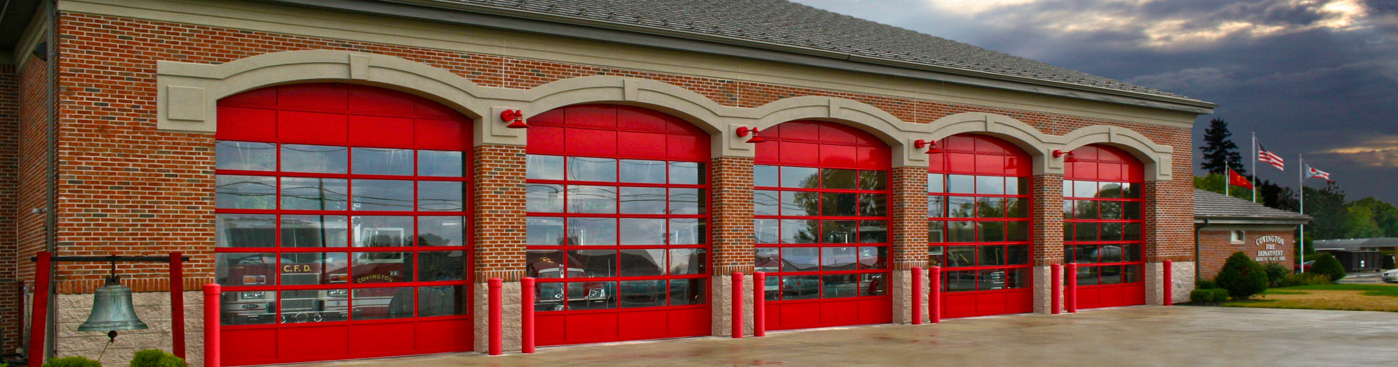 glass garage door attached to fire station